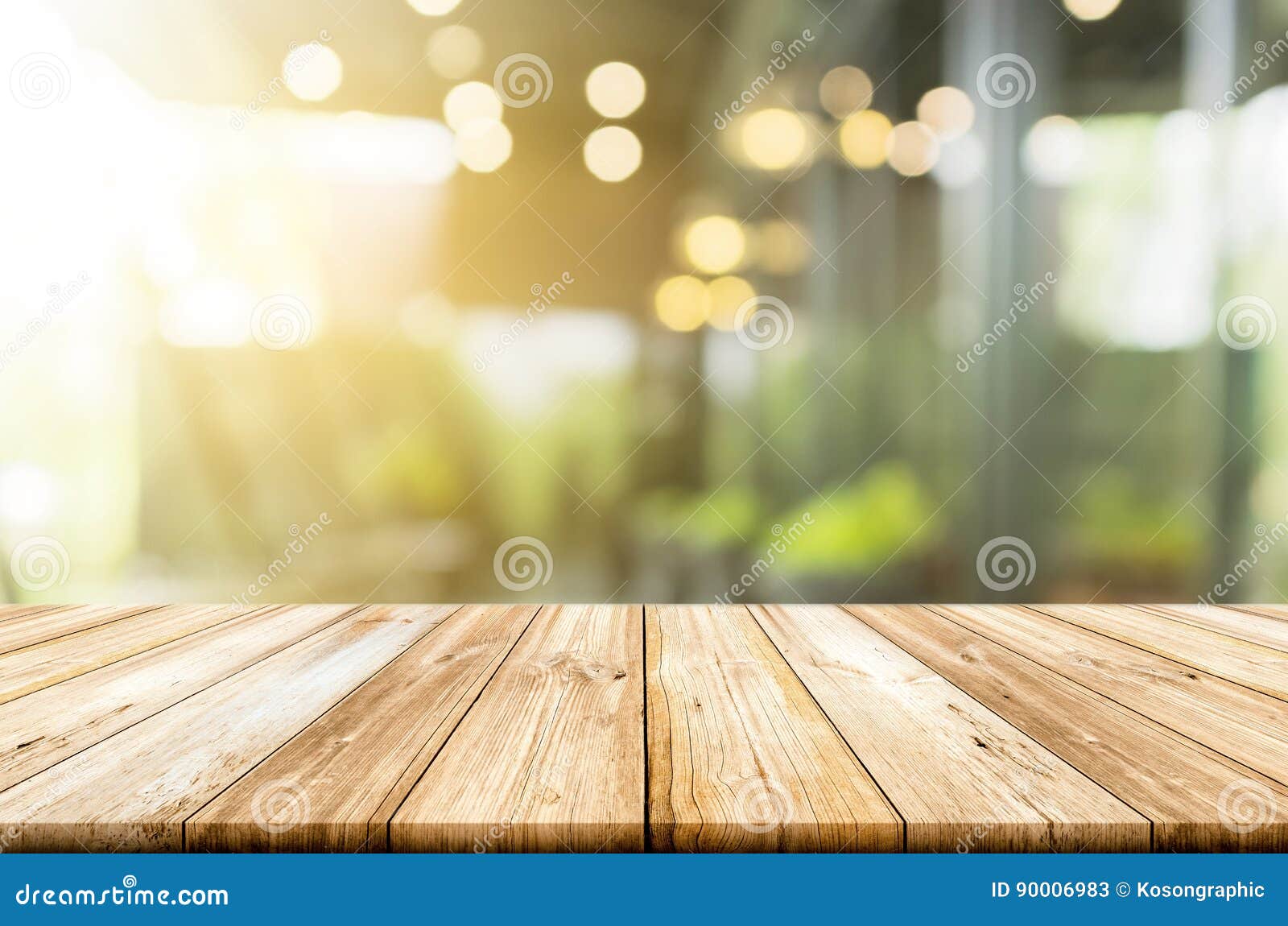 Empty Light Wood Table Top with Blurred in Coffee Shop Background Stock
