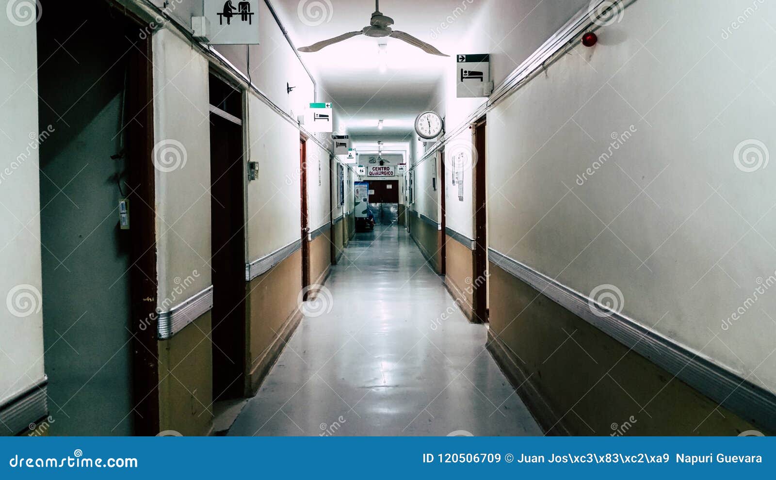 empty long corridor in the hospital, at the end of the corridor you can read that it says: surgical center