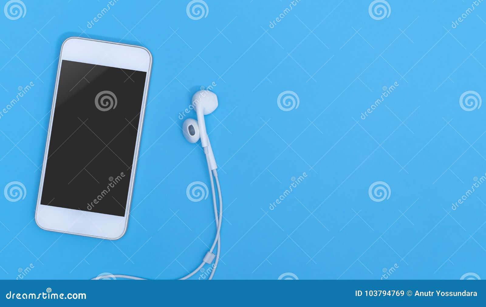 empty mobile phone screen with music earphone on blue copy space for poster