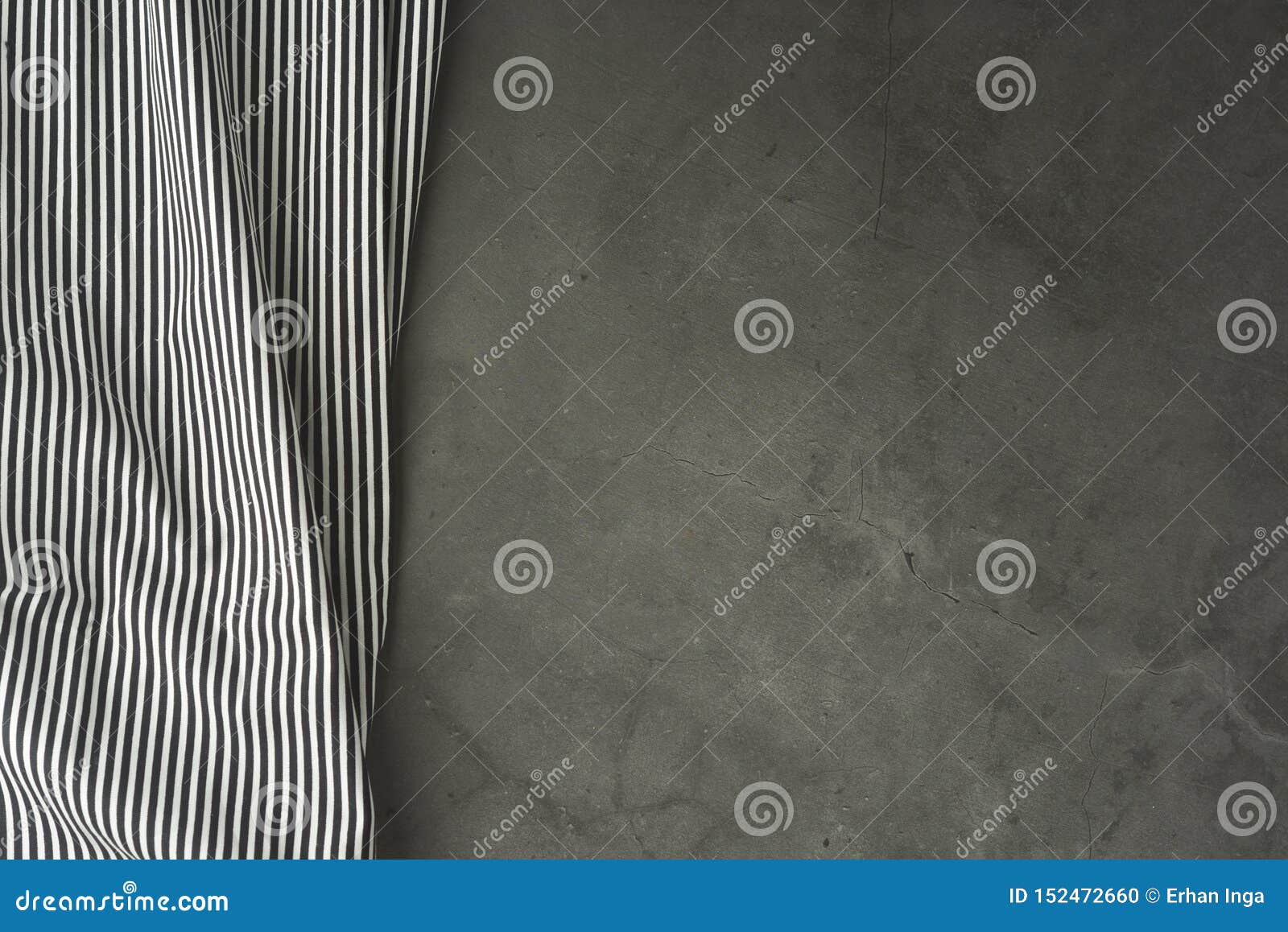 empty mockup for productor food or text. textured grey board with black and white fabric