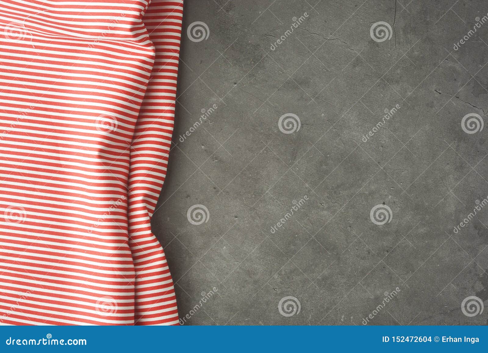 empty mockup for productor food or text. textured grey board with red fabric