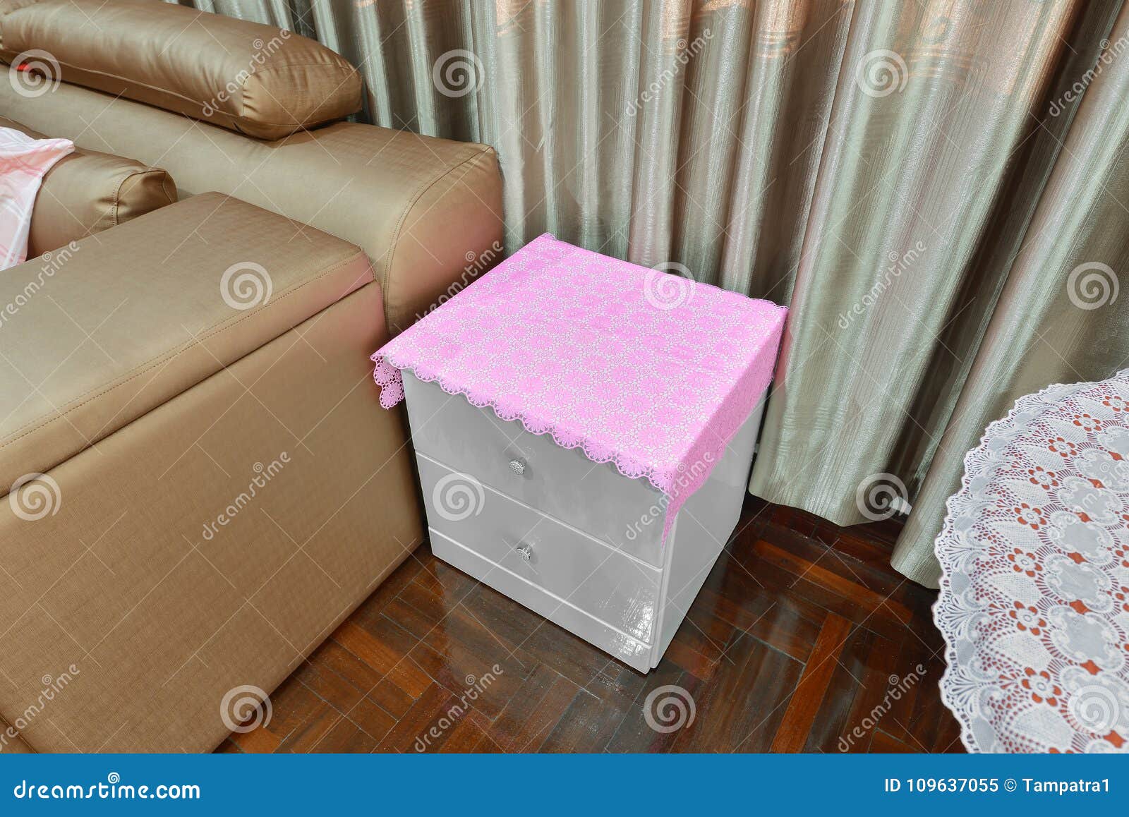 Empty Nightstand In Bedroom With Pink Fabric Covered Interior D