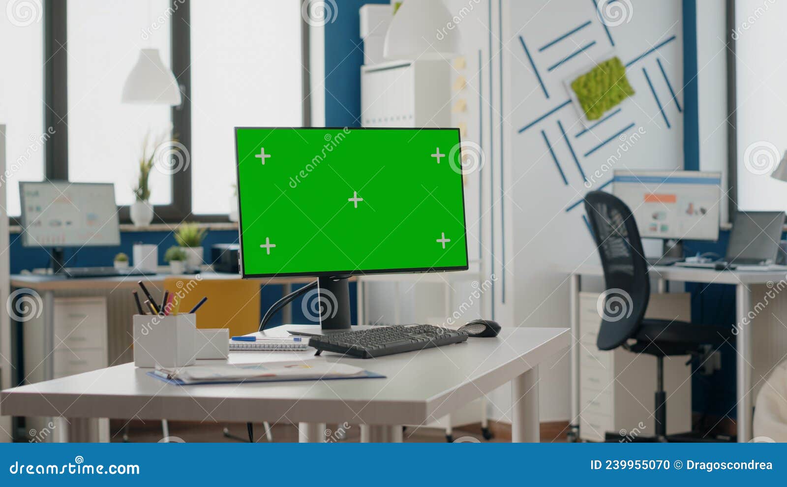 Empty Office with Green Screen on Computer Display Stock Photo Image