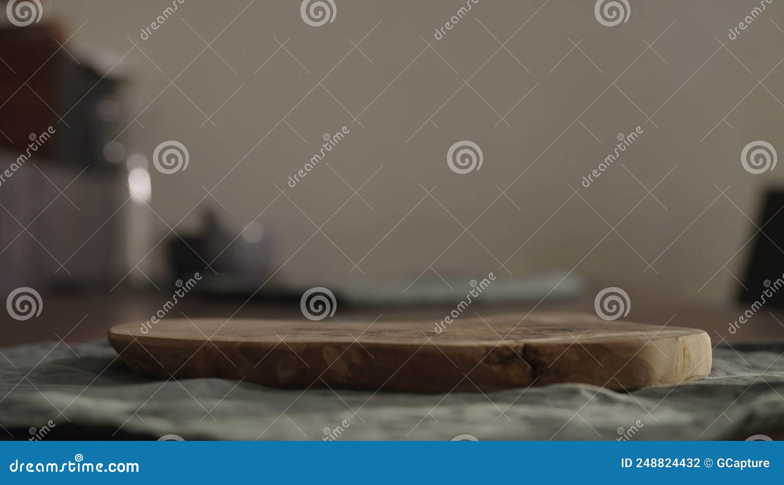 Empty Olive Cutting Board on Dining Table with Copy Space Stock Photo