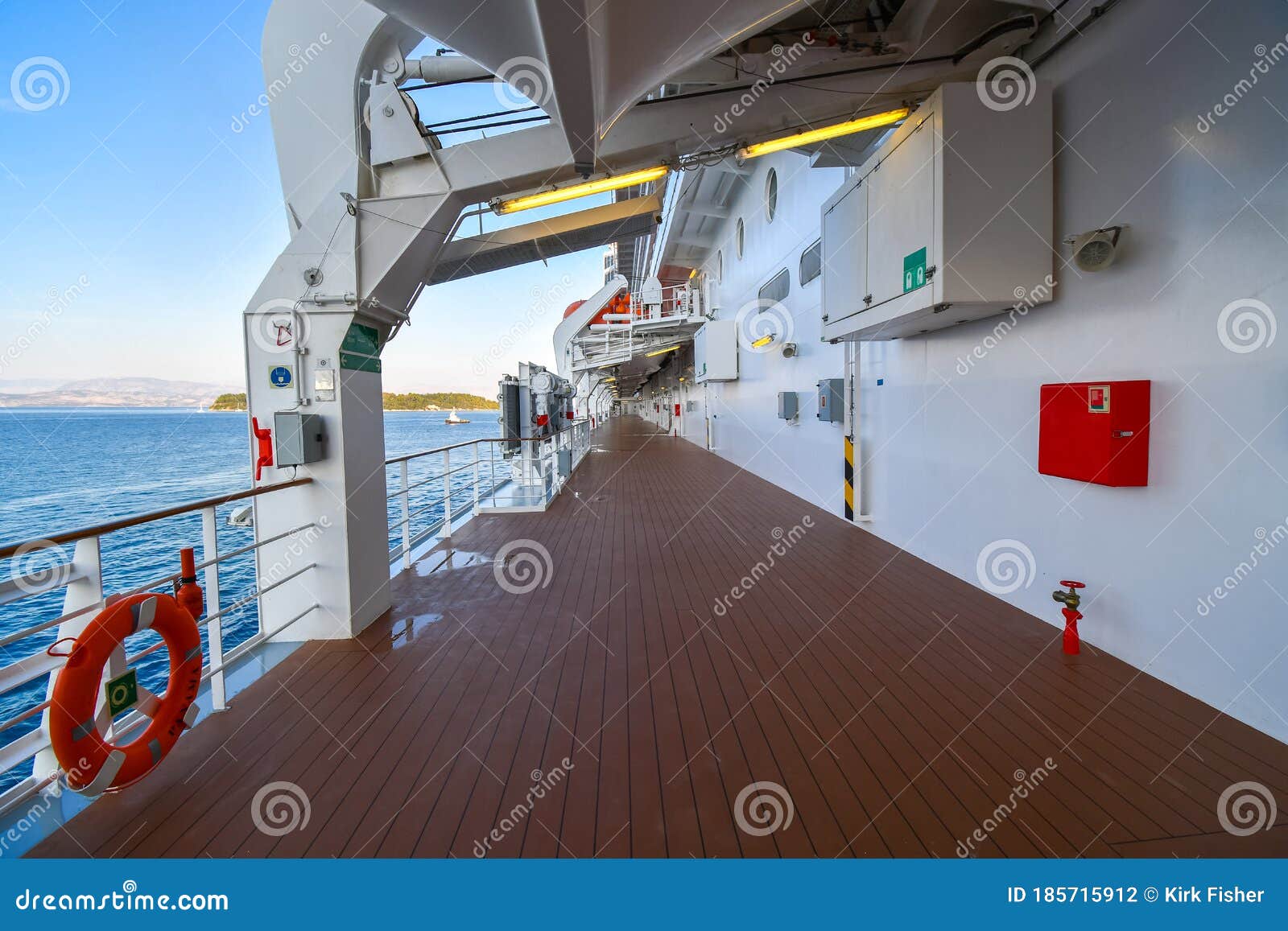 the empty outer deck of a cruise ship with no identifiable features cruising the aegean sea on a summer day