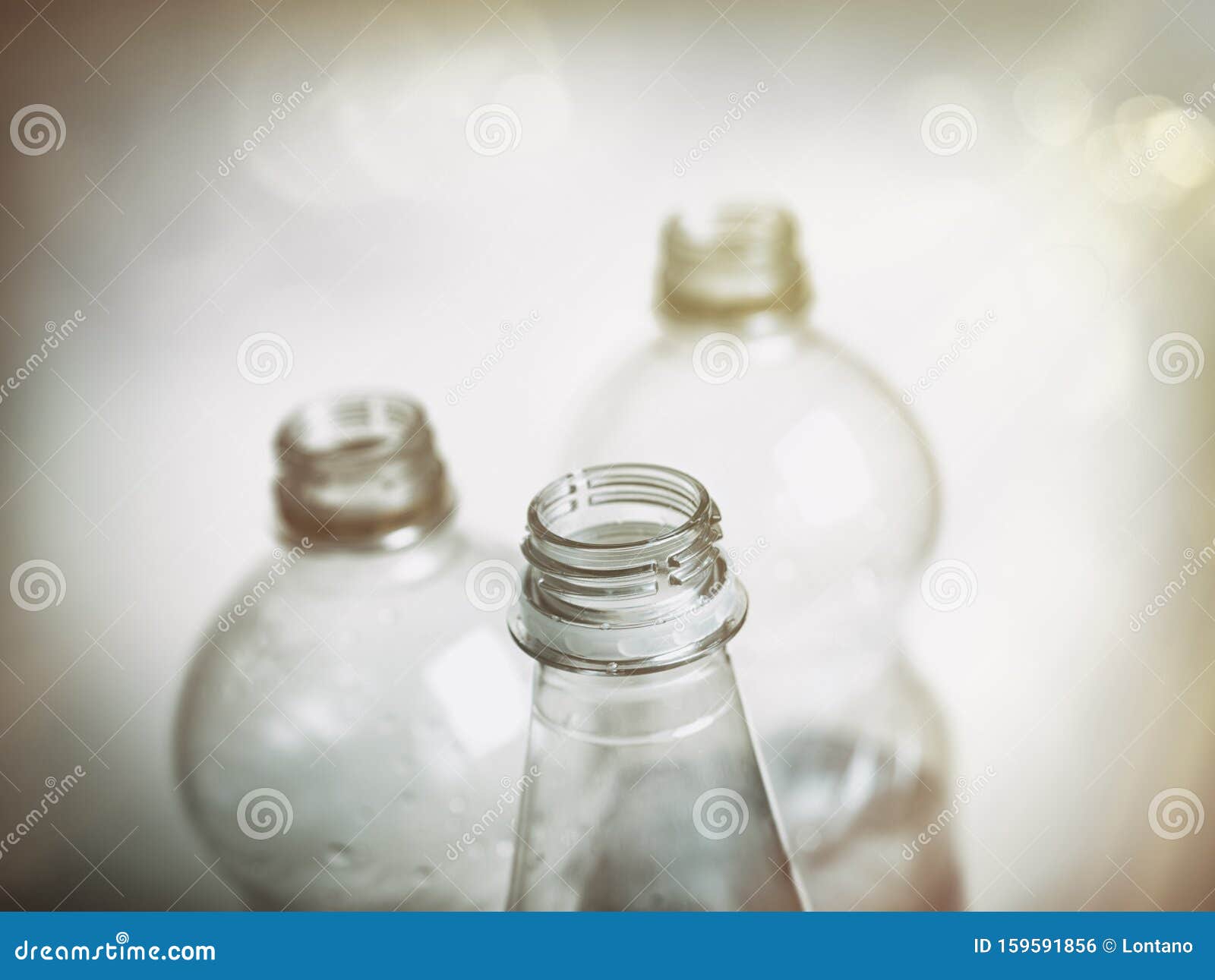 empty plastic soda bottles photographed in a vintage retro style