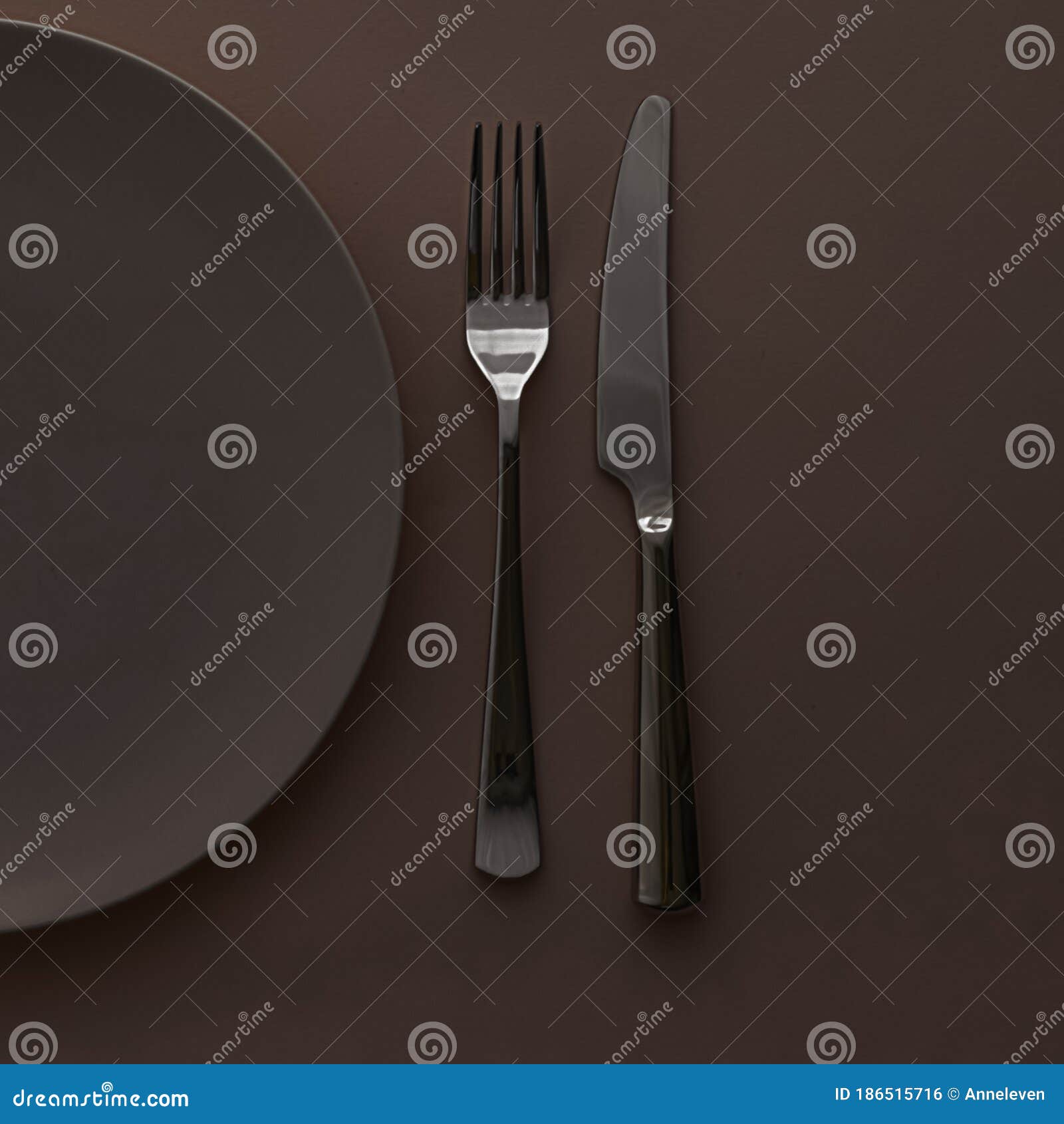 Download Empty Plate And Cutlery As Mockup Set On Dark Brown Background, Top Tableware For Chef Table ...