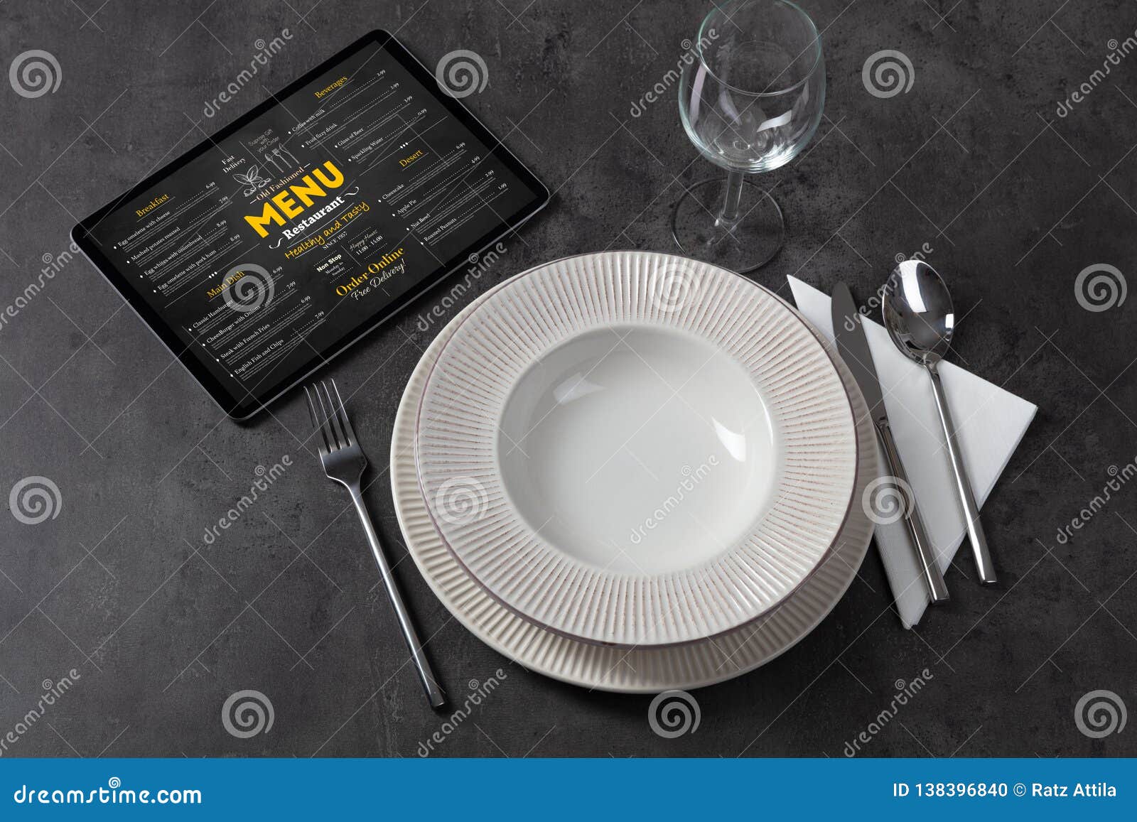 tableware with online menu on tablet