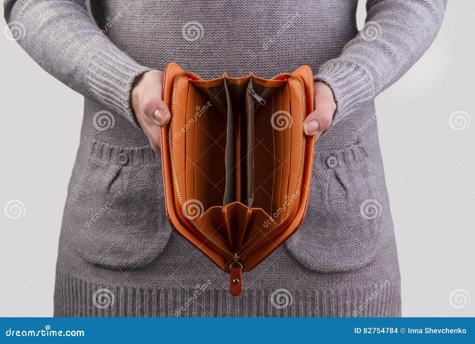 Woman Showing Empty Purse - Stock Photos | Motion Array