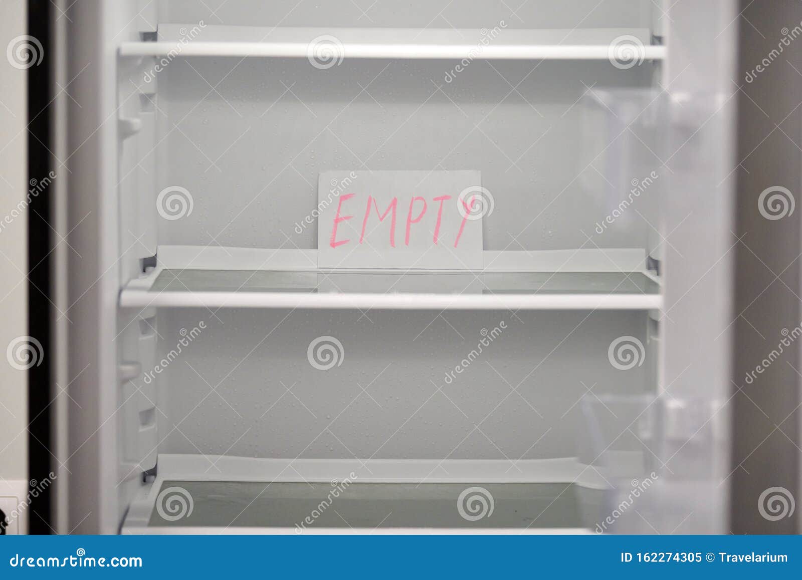 Empty Refrigerator Concept. Empty Shelves of New Refrigerator Stock