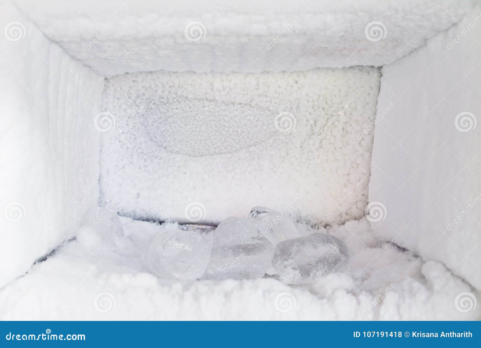 Empty of a Refrigerator. Ice Buildup Inside of a Freezer Walls Stock