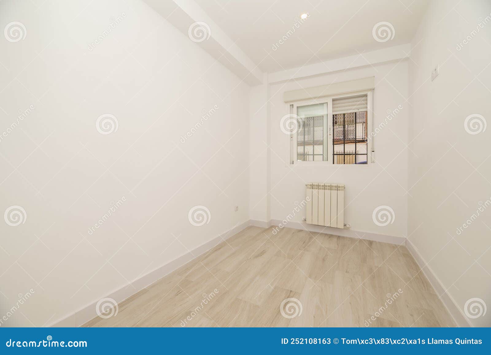 Empty Room with Light Wood Floorboards, White Painted Walls Stock Image