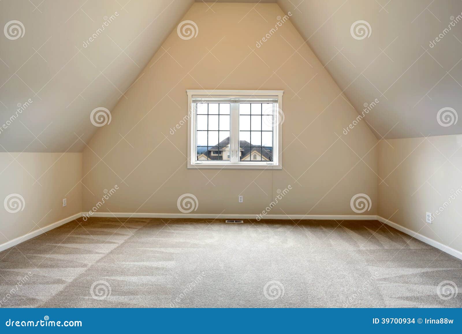 empty room with vaulted ceiling