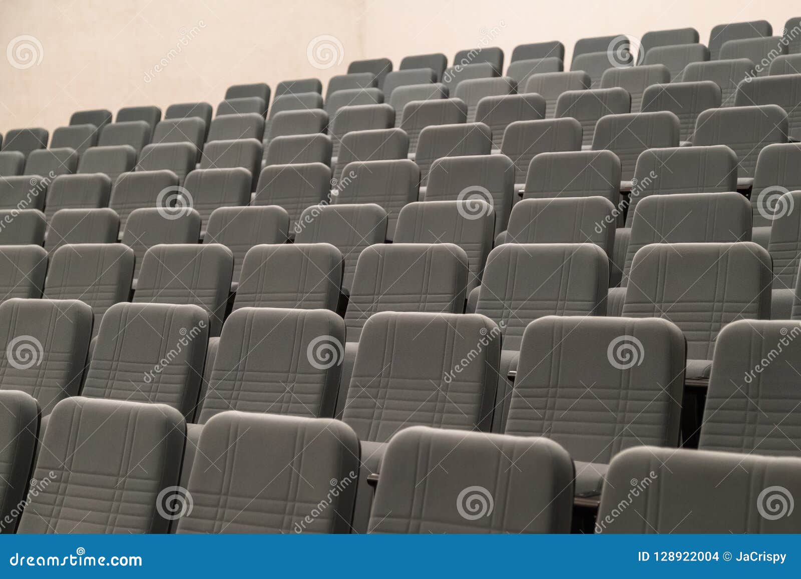Empty Rows of Comfortable Grey Seats Cinema or Theater Stock Photo