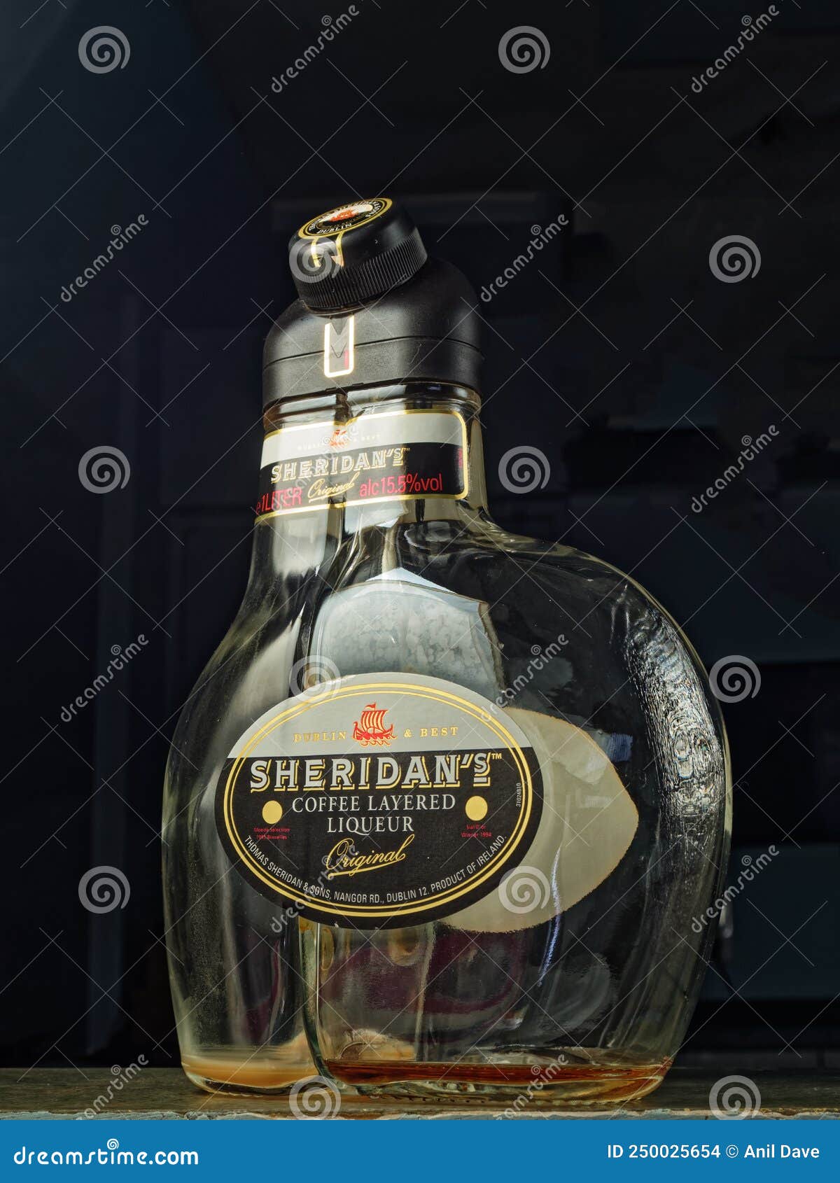 Empty Sheridan`s Coffee Layered Liqueur Bottel Studio Shot Editorial