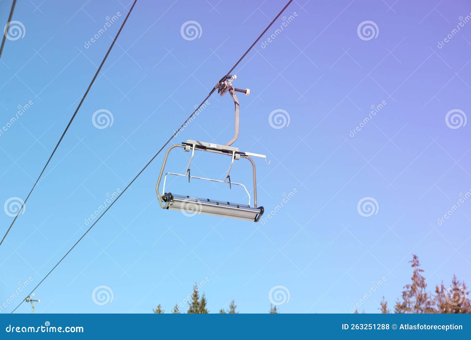Empty Ski Lift Against Blue Sky, Ski Season Concept Stock Photo Image