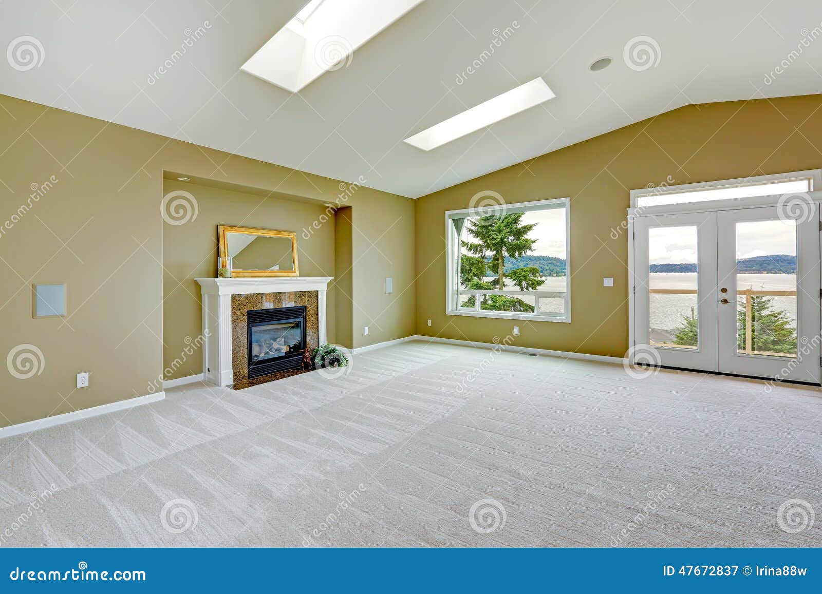 Empty Spacious Living Room With Walkout Deck And Fireplace