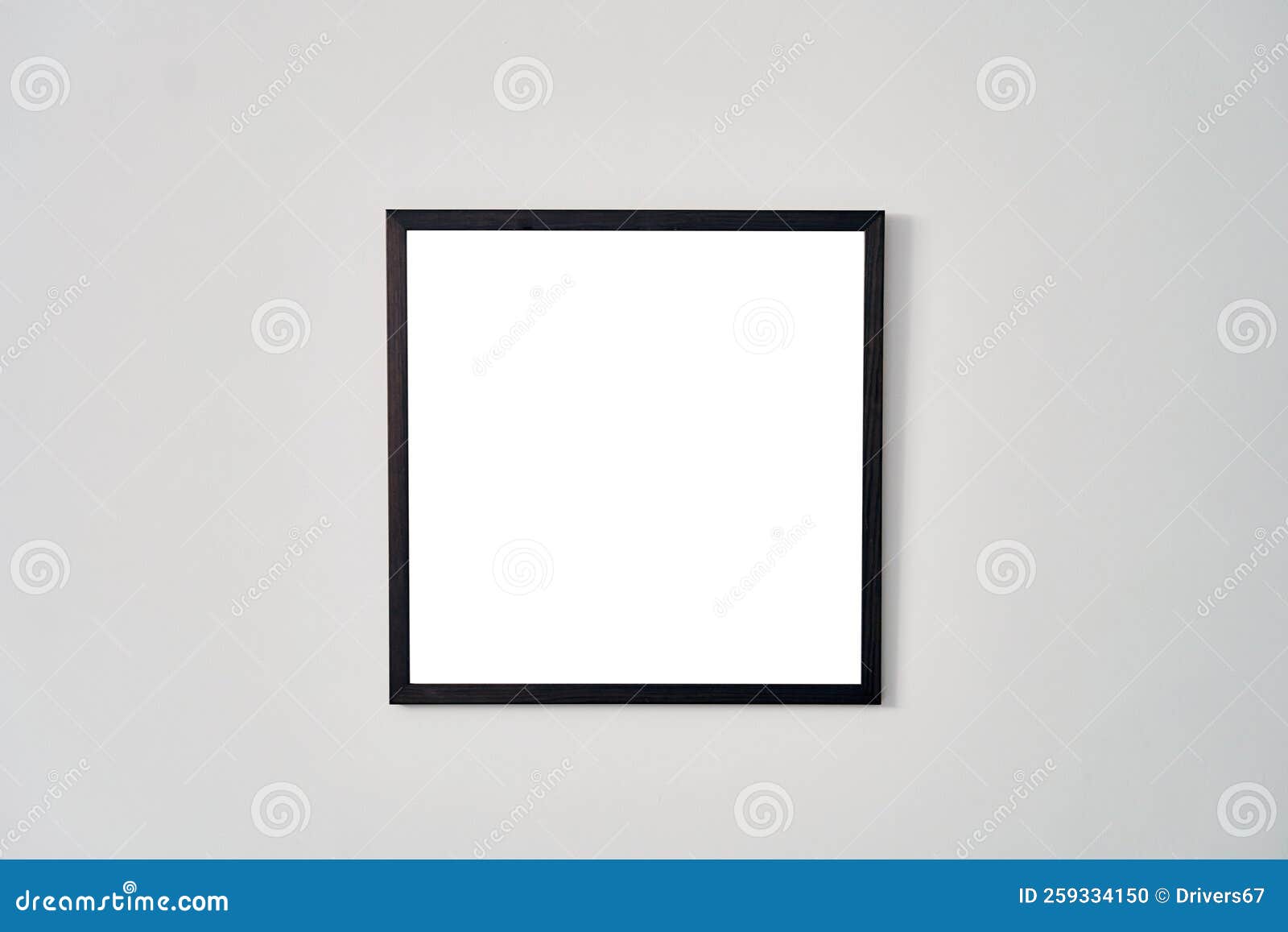 An Empty Square Photo Frame with a Black Border Hanging on a White Wall