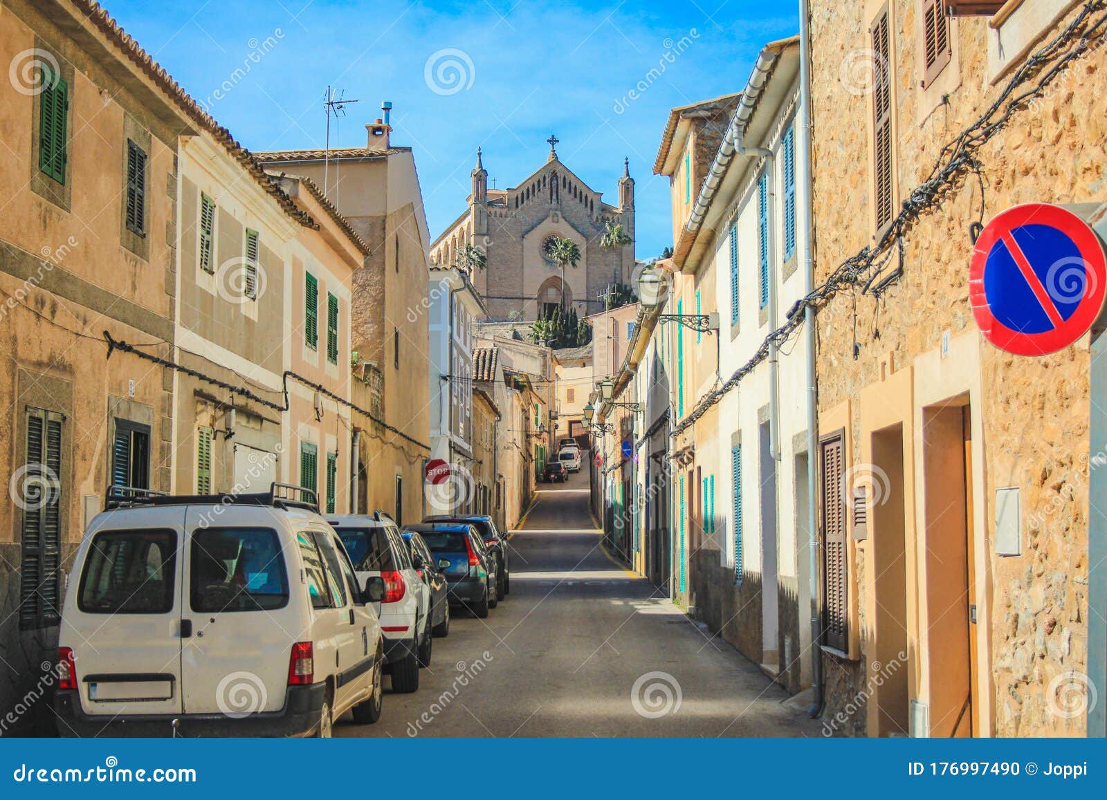 empty street in arta with transfiguracio del senyor church in the background - mallorca, spain