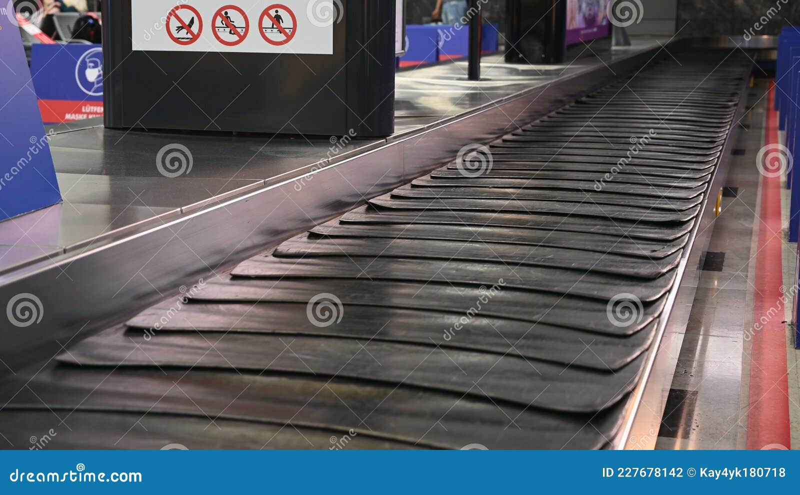 empty suitcase or luggage with conveyor belt at the airport.