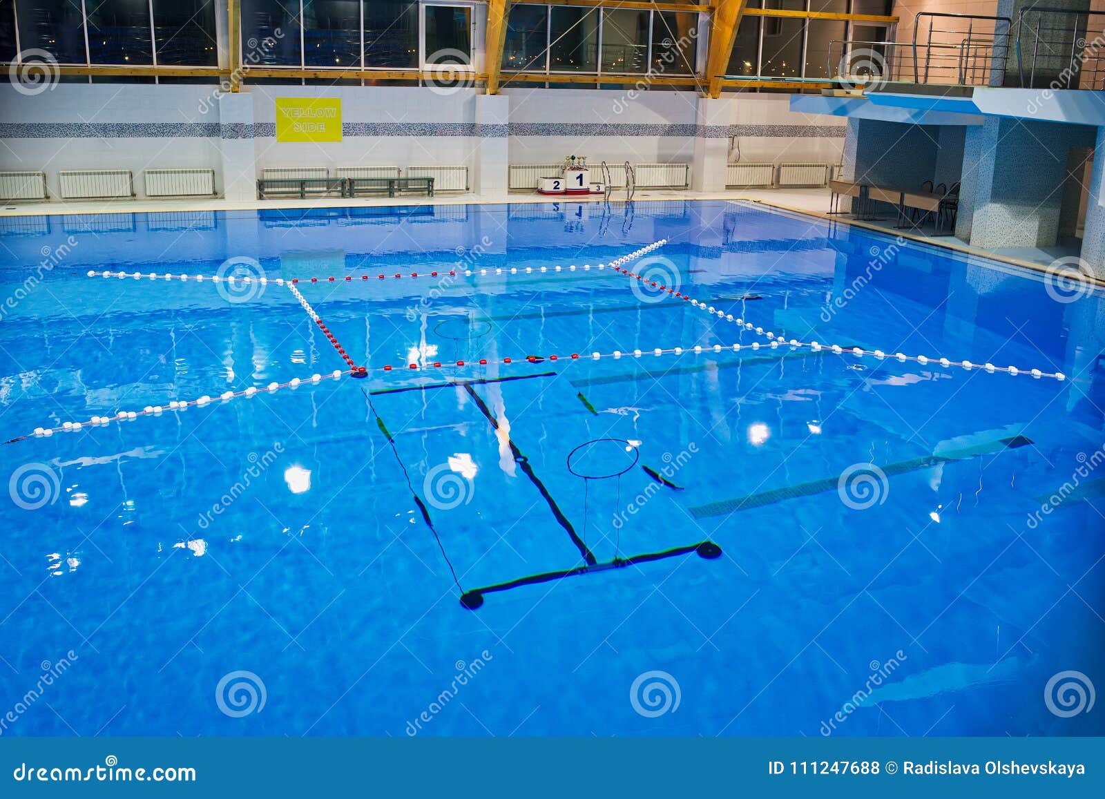 empty swimming pool, clear water surface.