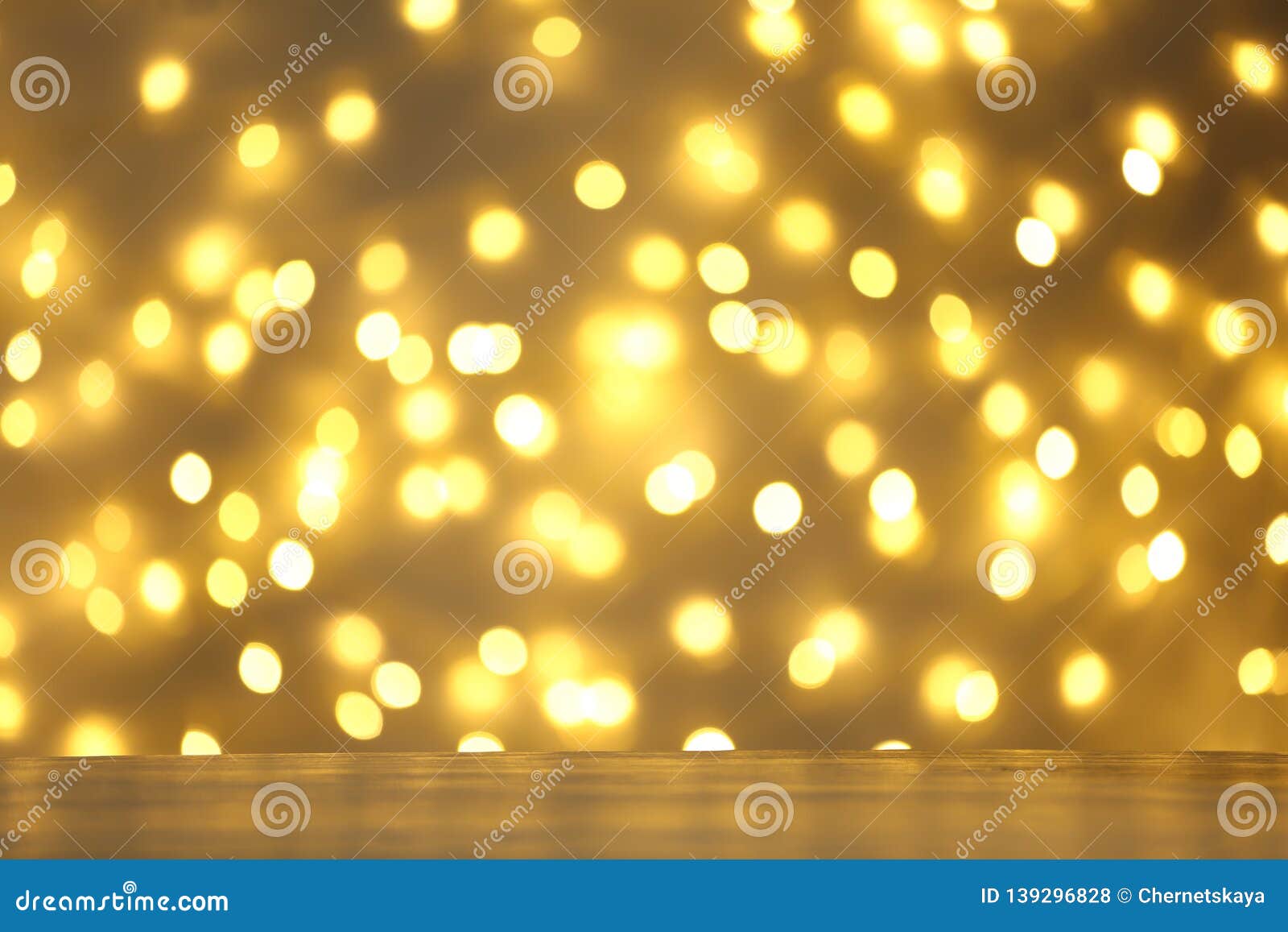 Empty Table Against Golden Bokeh Background. Stock Photo - Image of ...