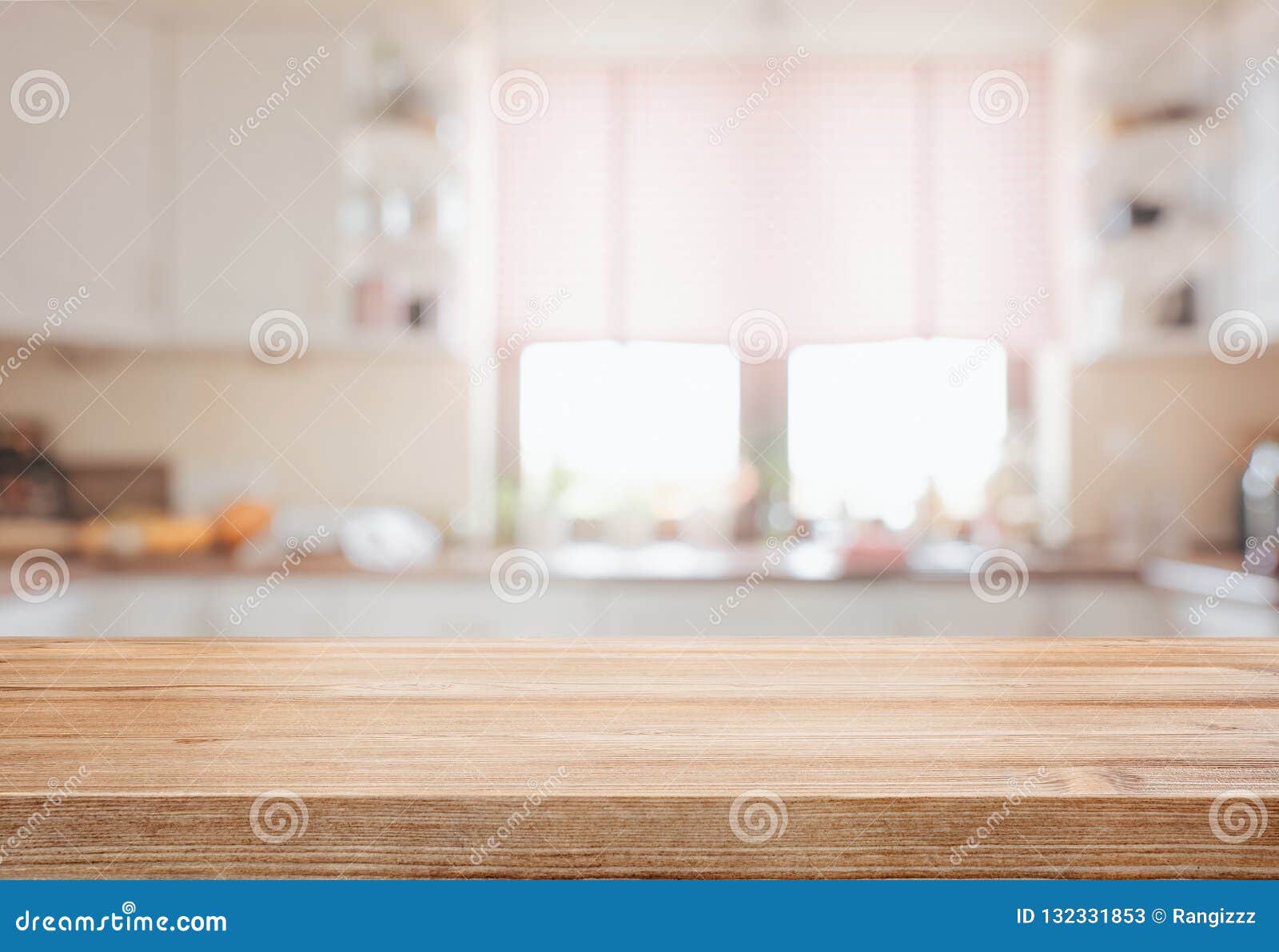 empty tabletop over defocused kitchen