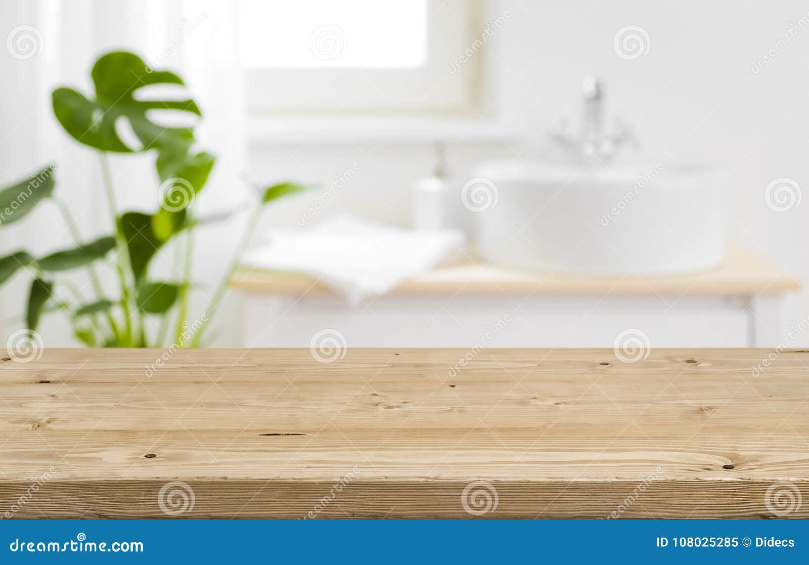 empty tabletop for product display with blurred bathroom interior background