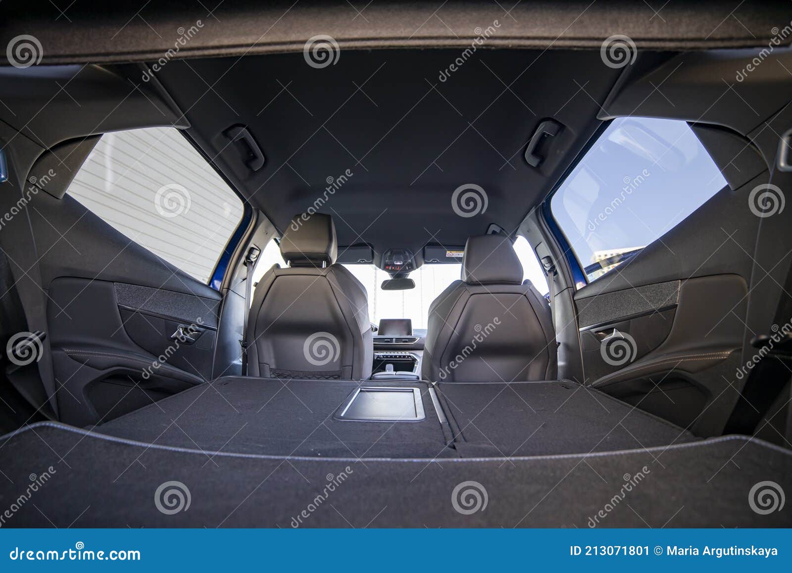 Empty Trunk of a Modern Car with Folded Rear Seats. Large Interior