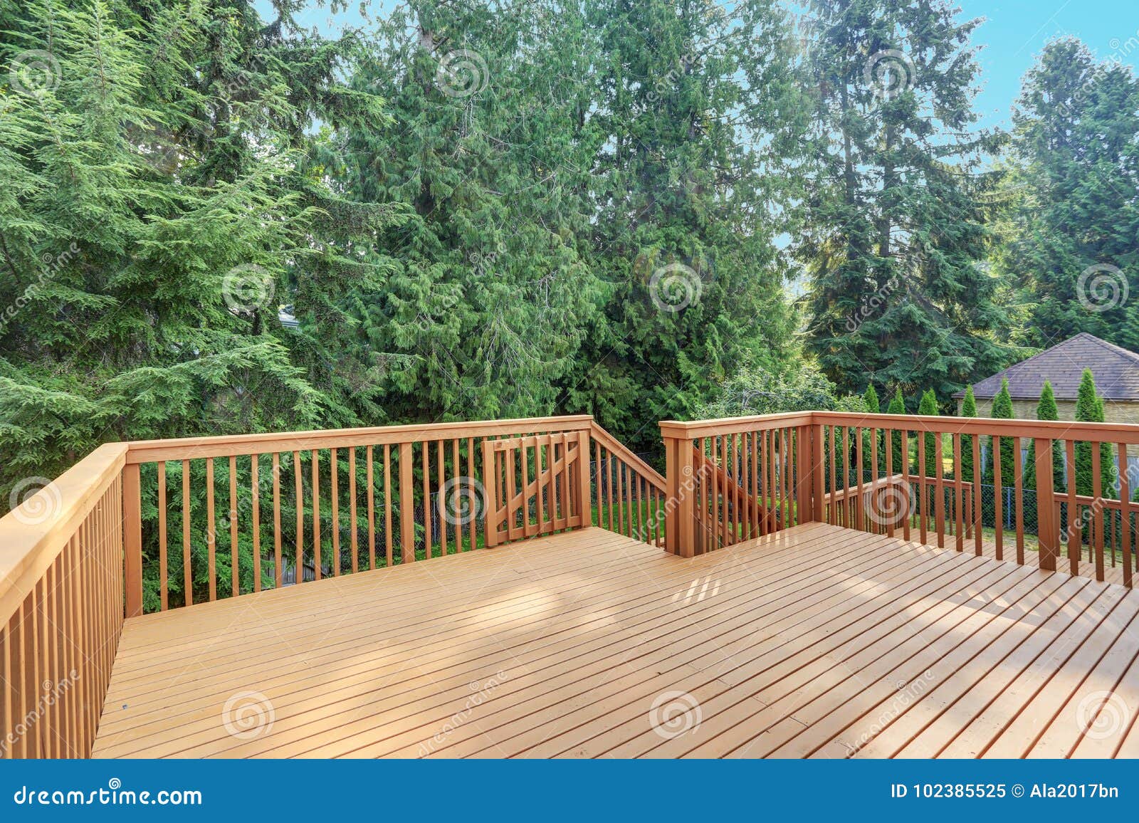 empty walkout deck with redwood railings