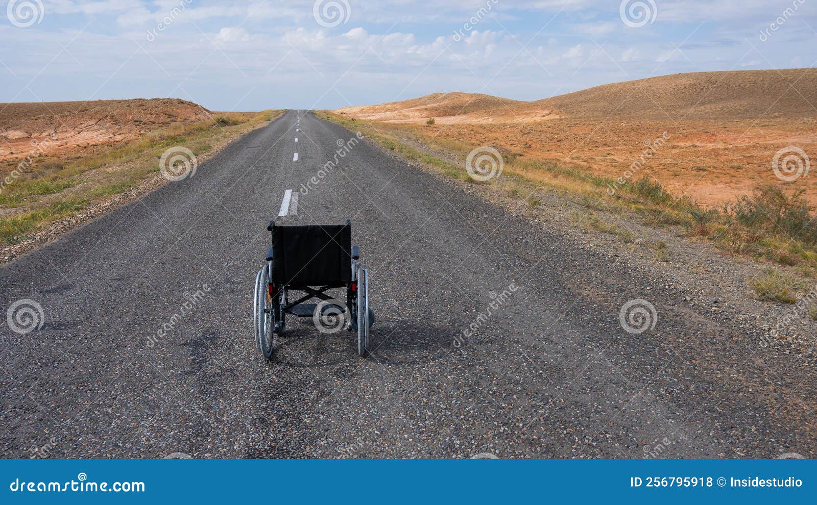Empty Wheelchair on the Highway in the Steppes. Stock Photo Image of