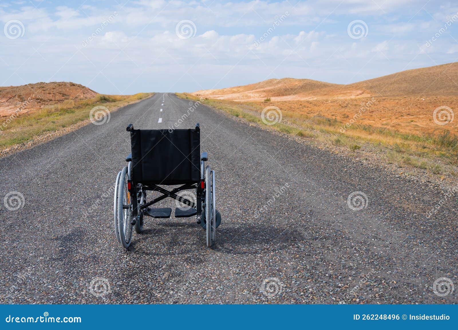 Empty Wheelchair on the Highway in the Steppes. Stock Photo Image of