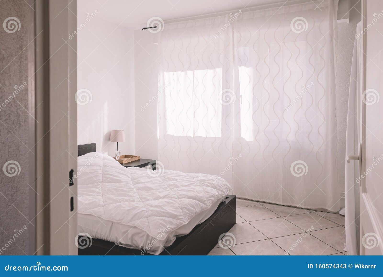 Empty White Bedroom with Natural Lighting Stock Image - Image of curtains, bedclothes: 160574343