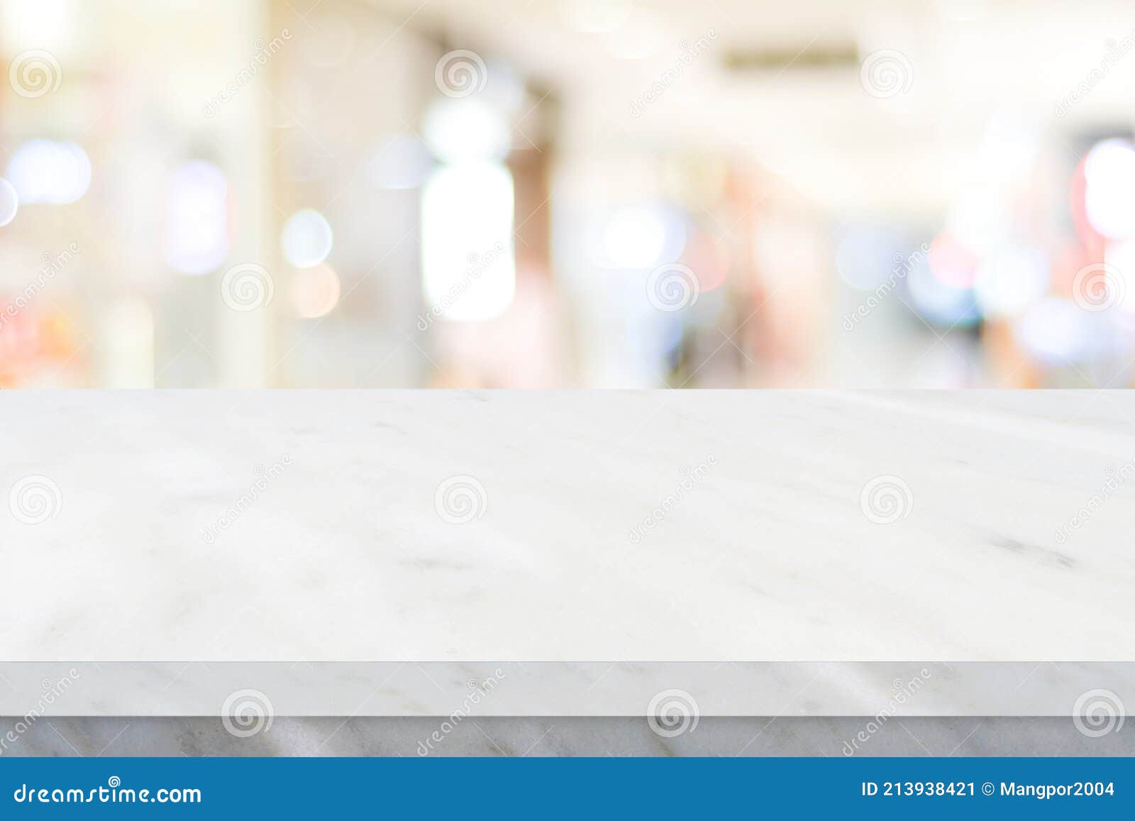 empty white table top, counter, desk over blur perspective store with bokeh light background, white marble stone table, shelf and