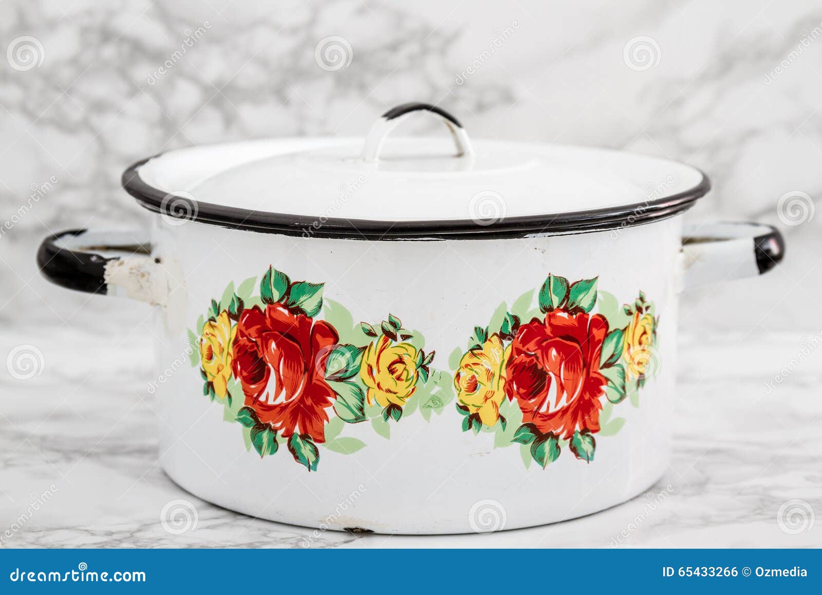 Empty White Vintage Enamel Saucepan with Flower Design Stock Photo