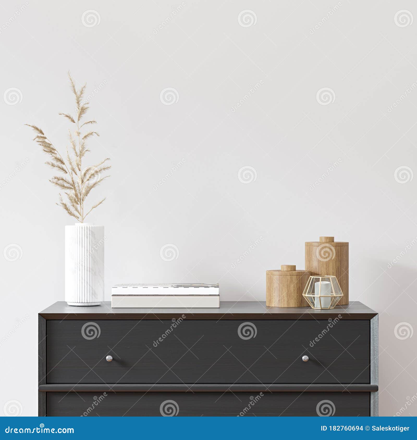 empty white wall with black dresser, white vase and wood decor.