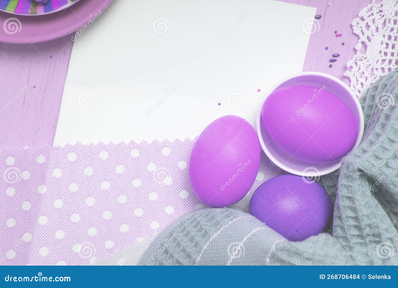 empty wite list easter background with fantastic violet colored eggs