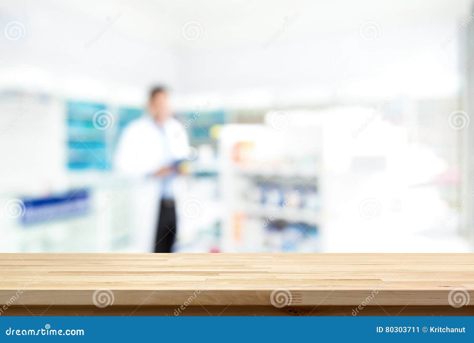 empty wood counter top on blur pharmacy background