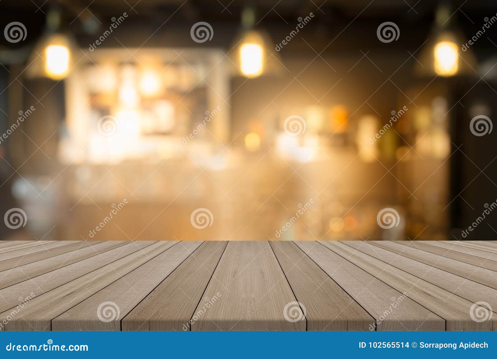 empty wood table top on blurred background form coffee shop