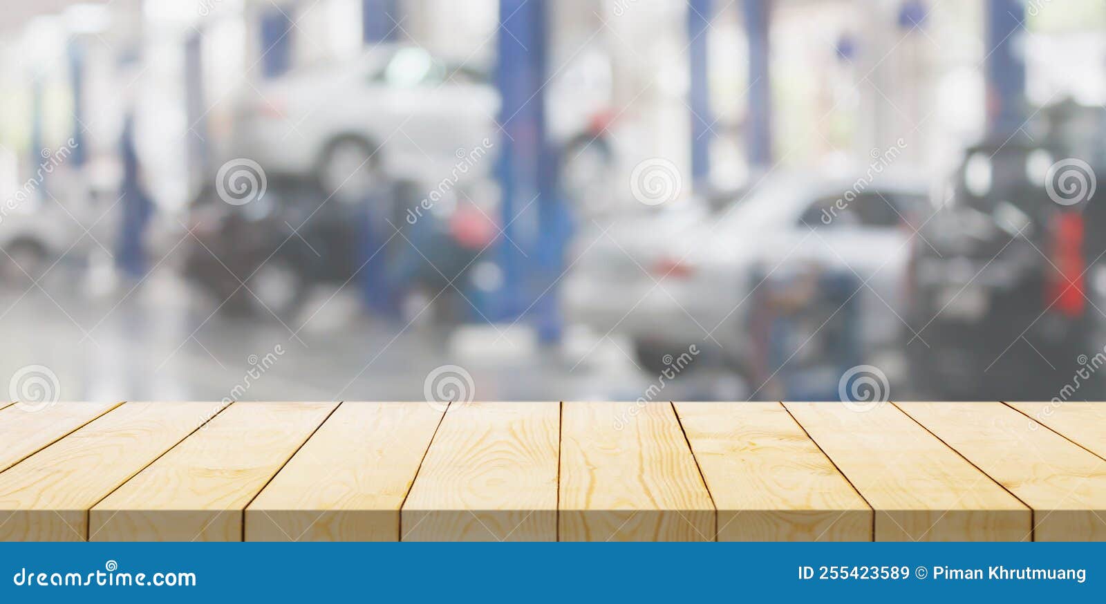 Empty Wood Table Top with Car Service Centre Auto Repair