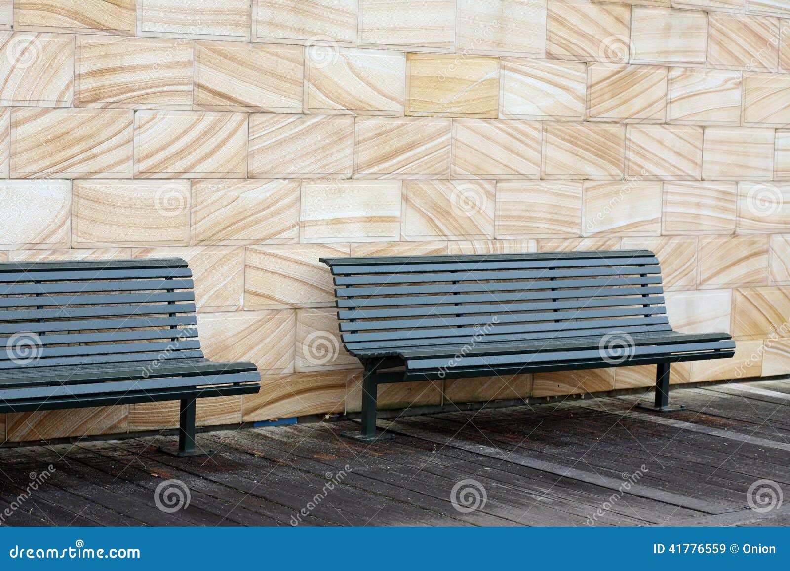Wooden Benches On The Promenade In The Park. Massive Concrete Bench