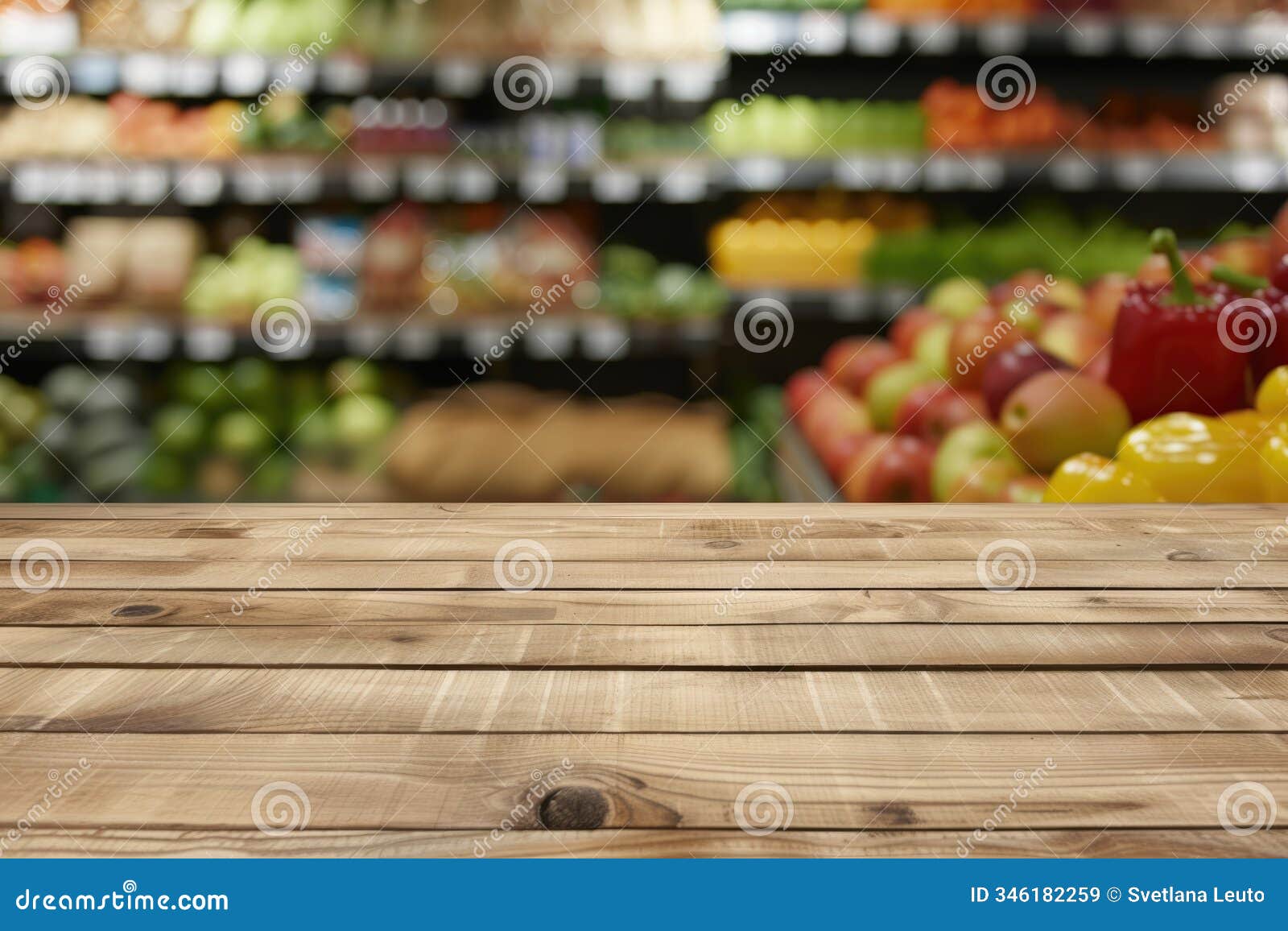 an empty wooden table for displaying products and goods, a supermarket on a blurred background, a department with vegetables and