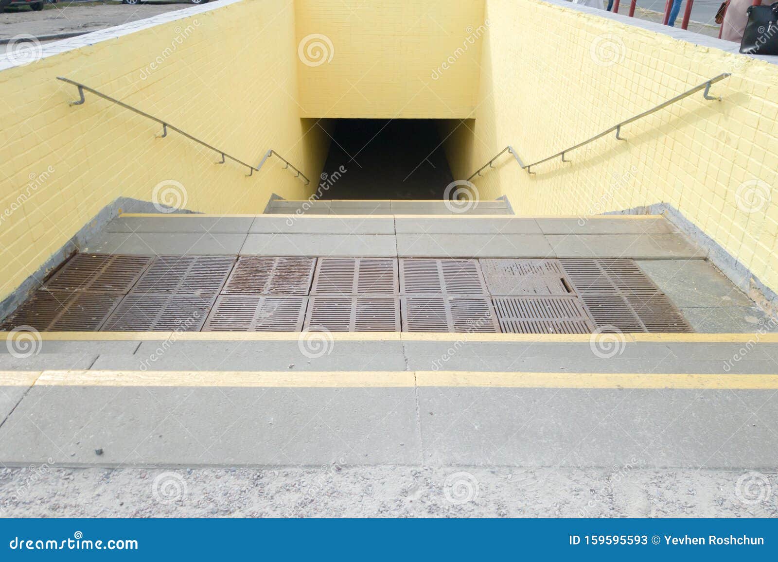 Empty Yellow Underground Pedestrian Crossing. Tunnel and Daylight at ...