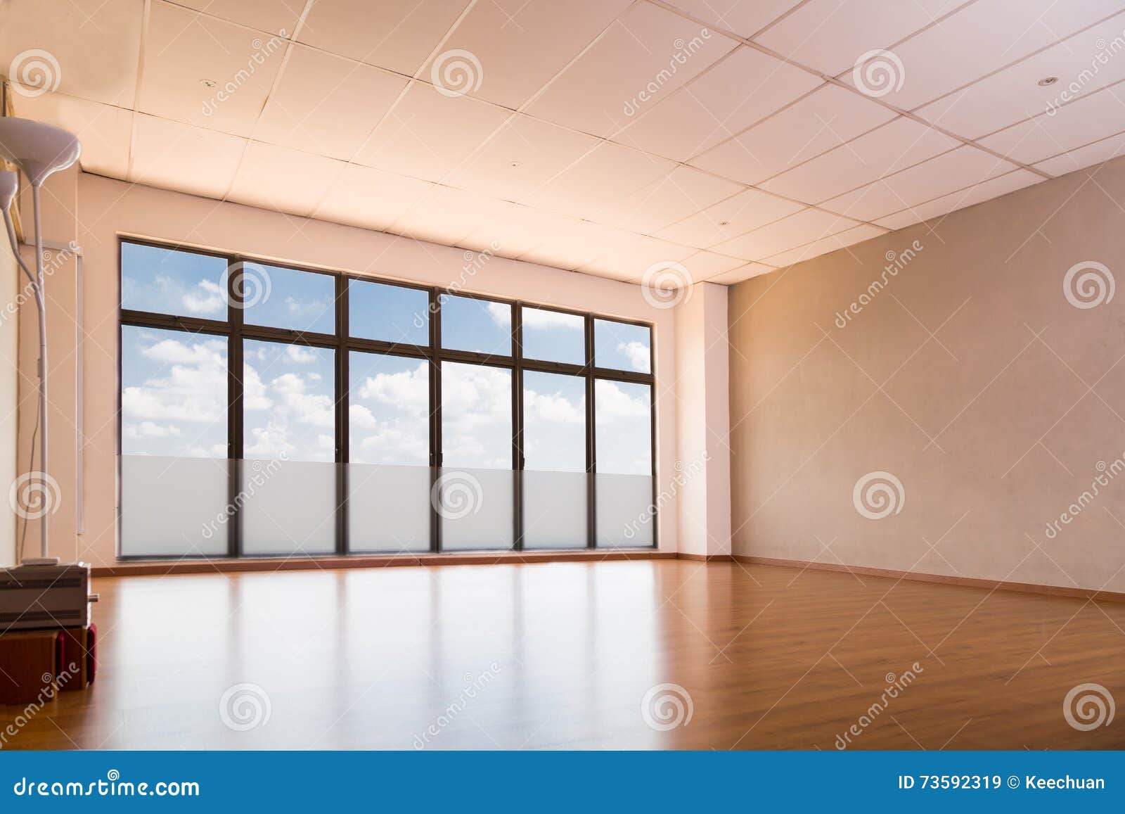 Empty Yoga Studio with Wooden Flooring, Windows with Blue Sky Stock