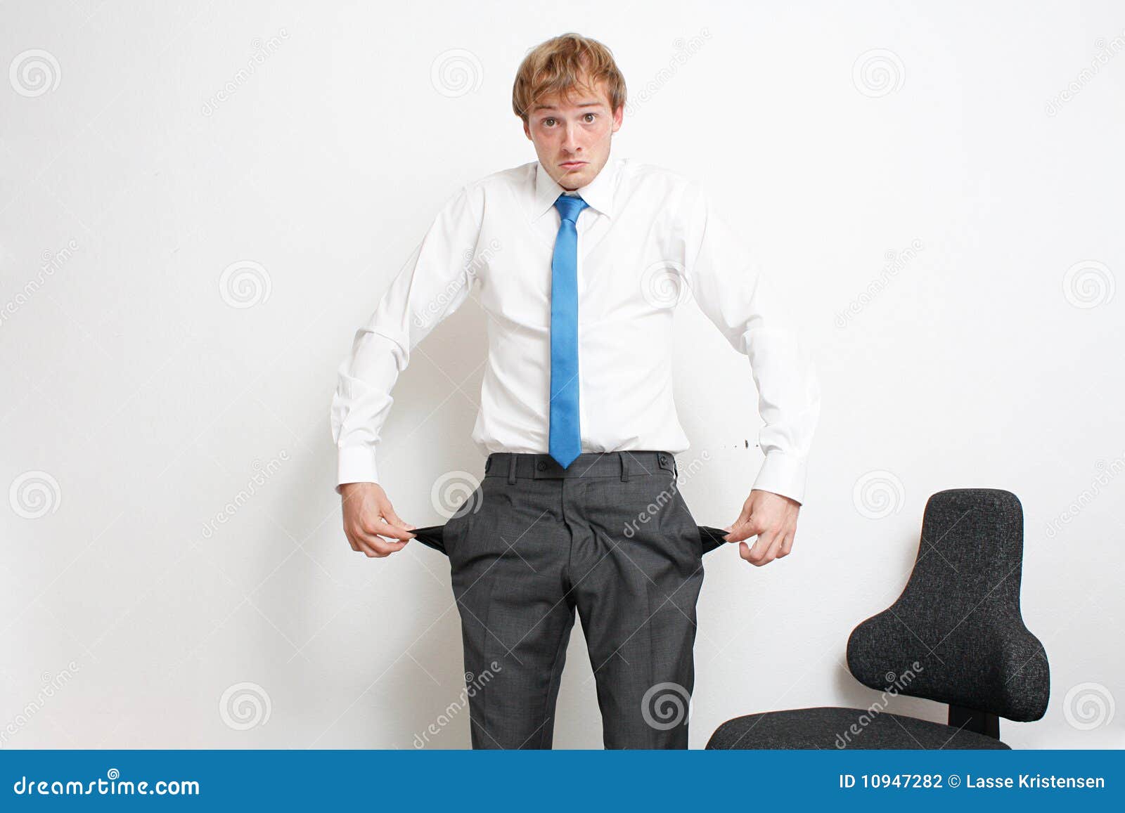 Emptying pockets stock photo. Image of corporate, moneyless 10947282