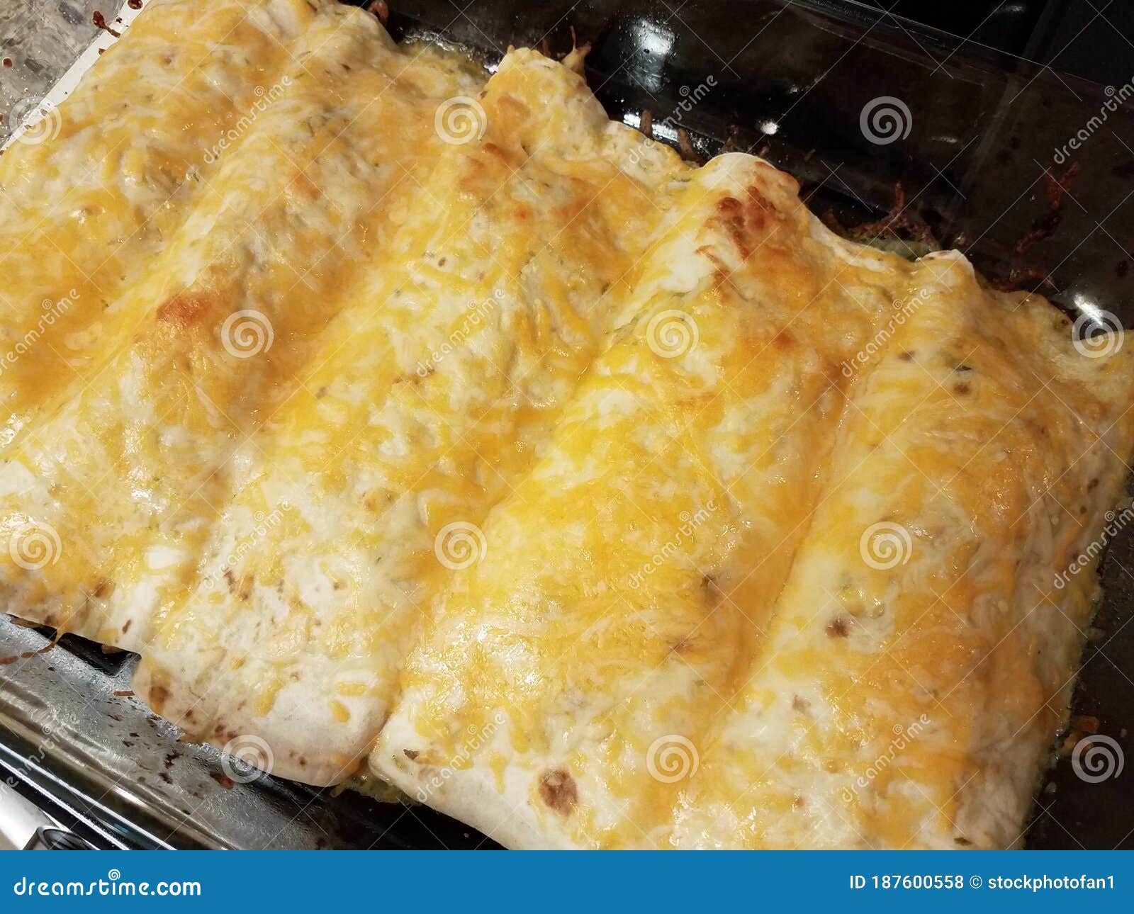 Enchiladas with Cheese in Glass Pan on Stove Stock Photo Image of