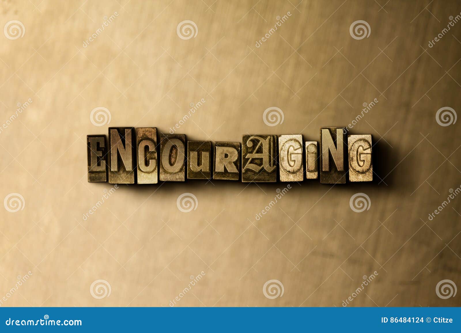 ENCOURAGING - Close-up of Grungy Vintage Typeset Word on Metal Backdrop