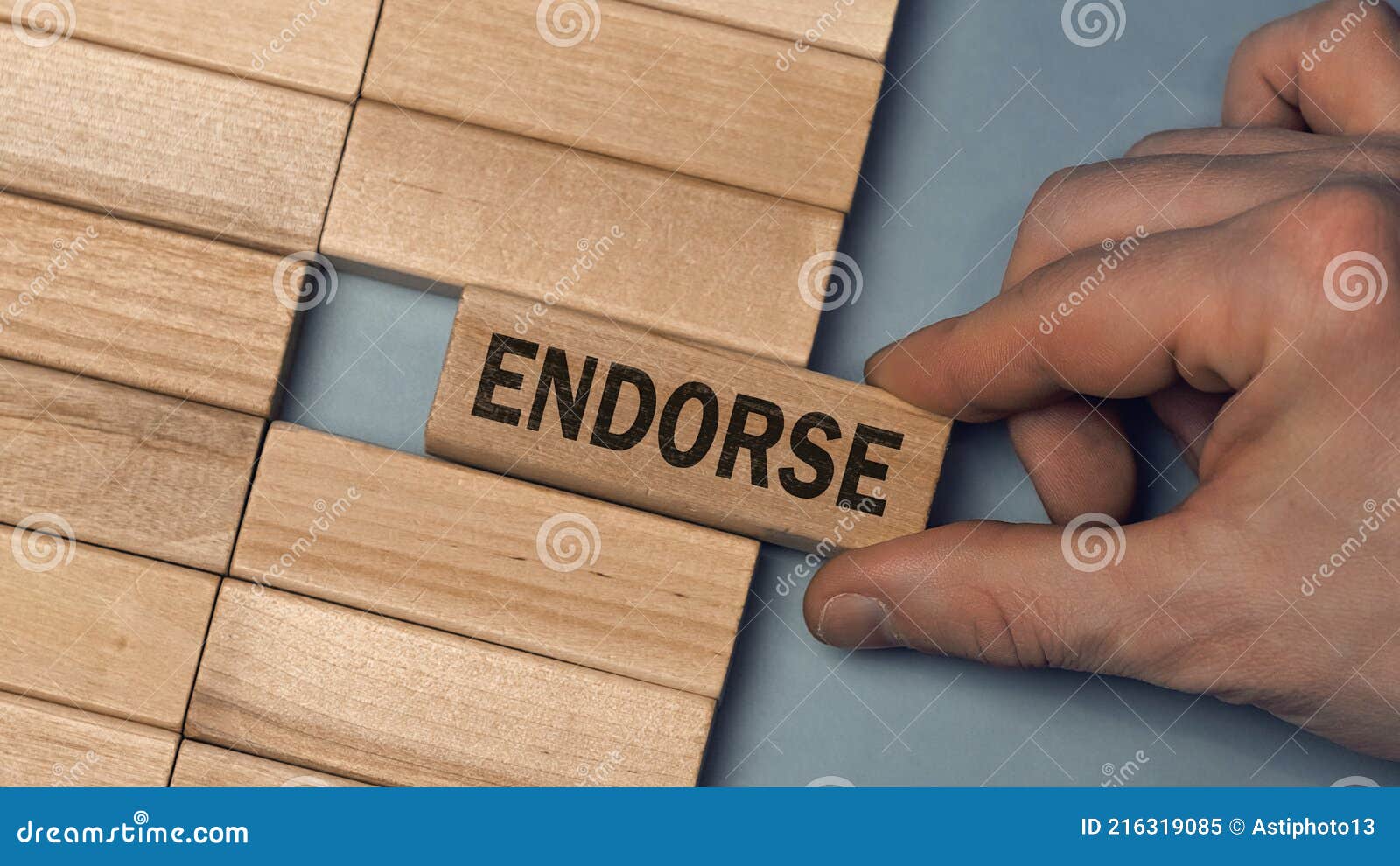 endorse word concept. close-up wooden piece blocks on the table