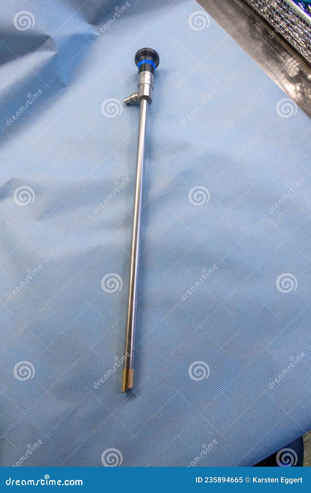 An Endoscopy Optic for Performing an Abdominal Endoscopy Lies on a Blue