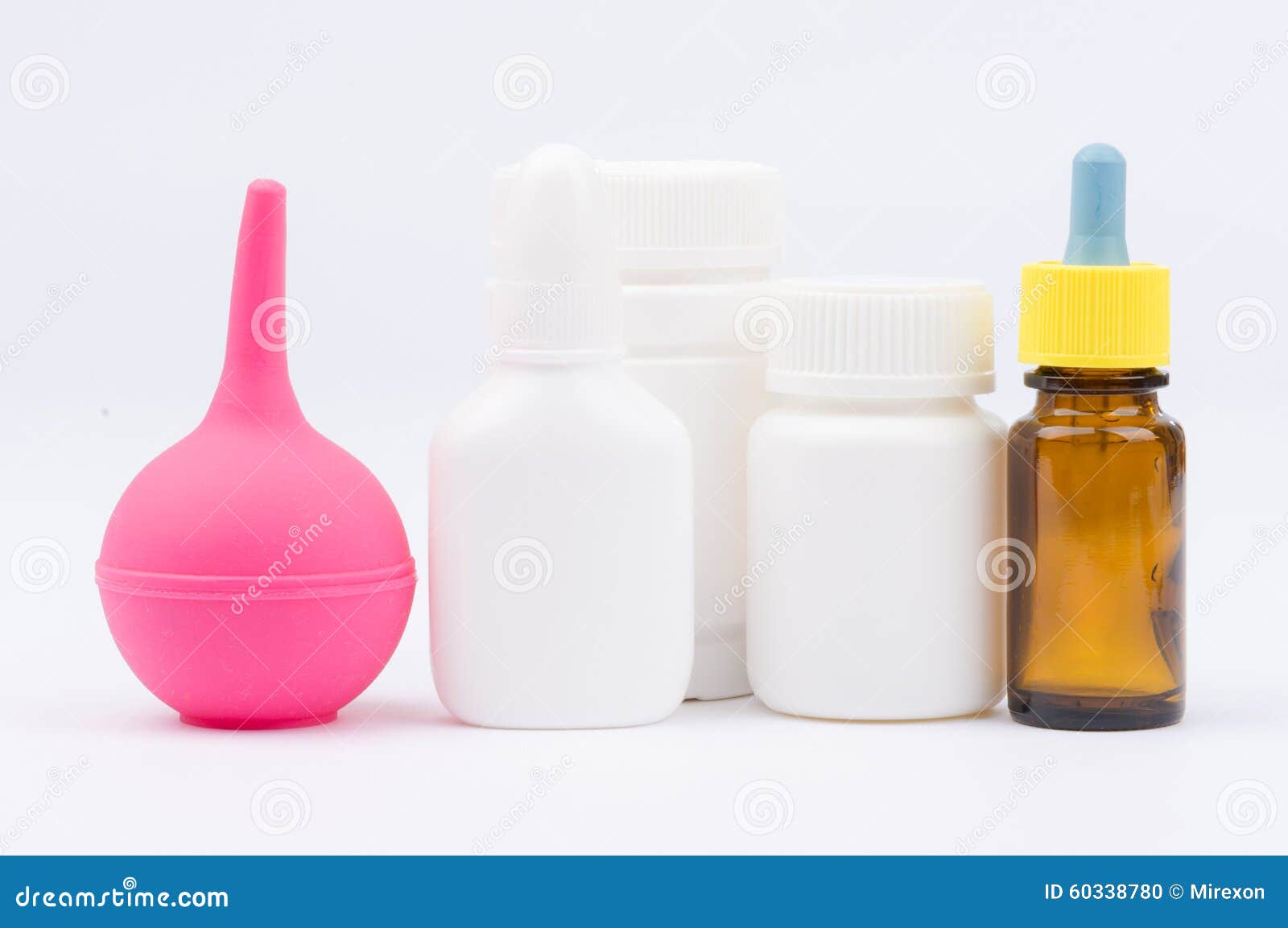 Enema with Bottles of Medicine and Nose Drops Stock Photo Image of